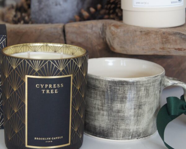 Kerze Tasse und Tee