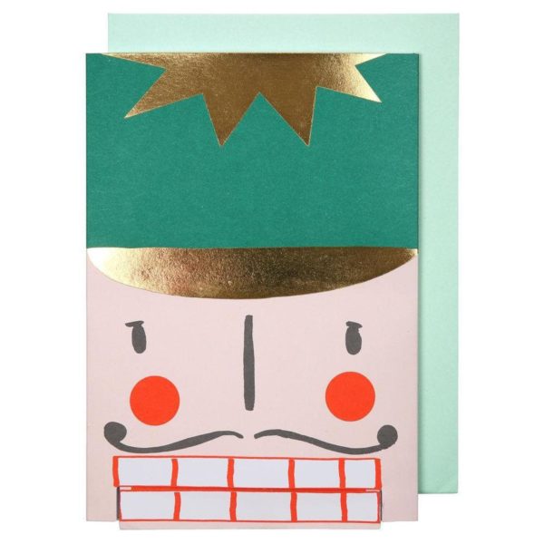 Eine lustige mechanische Karte Merry Christmas als Nussknackerkopf.